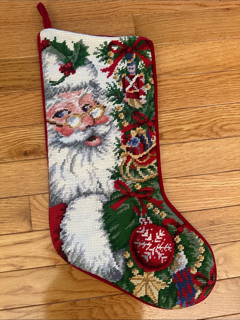Hand-stitched wool needlework Santa Claus holiday stocking